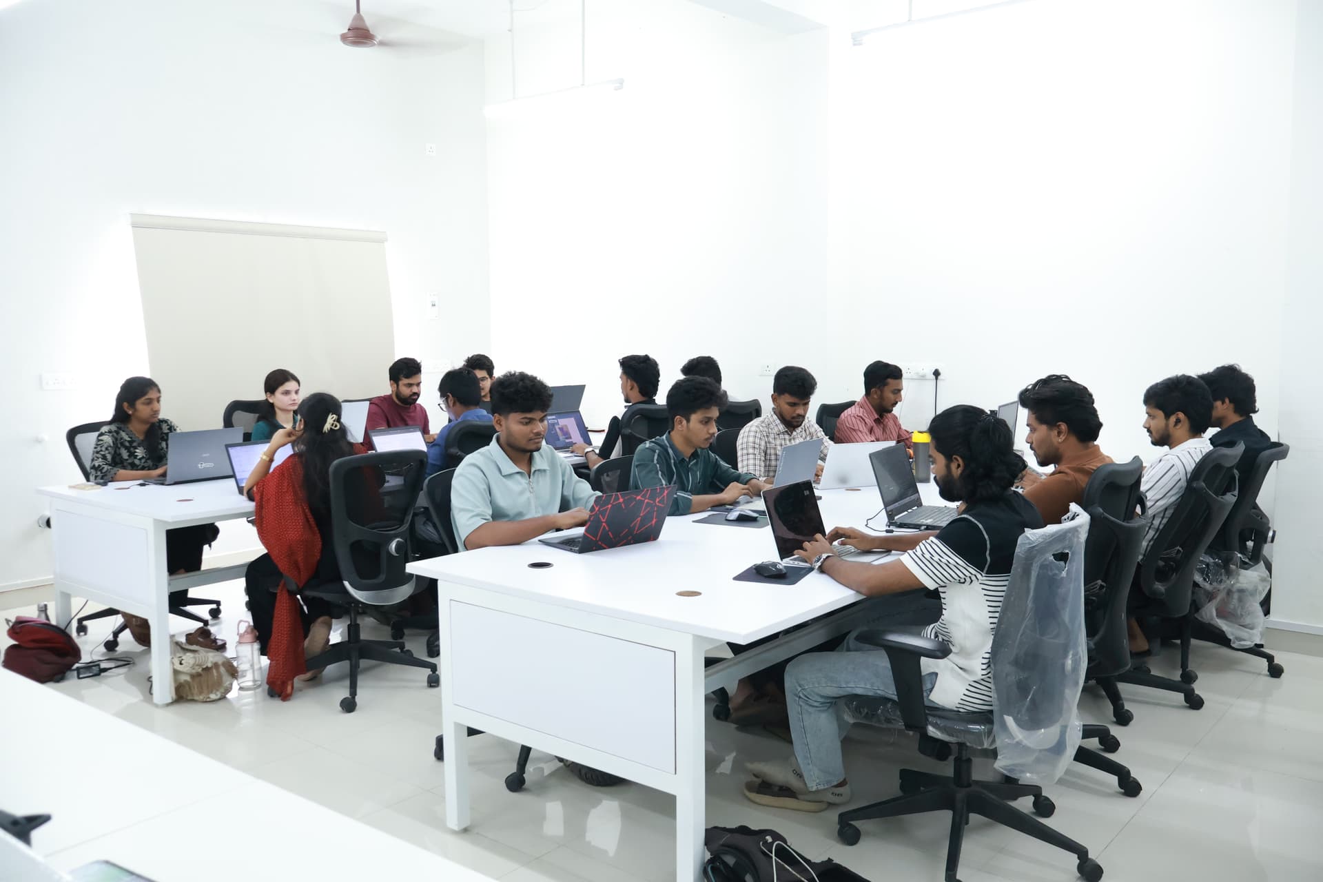 Corporate leaders and innovation partners discussing a business partnership in a modern office