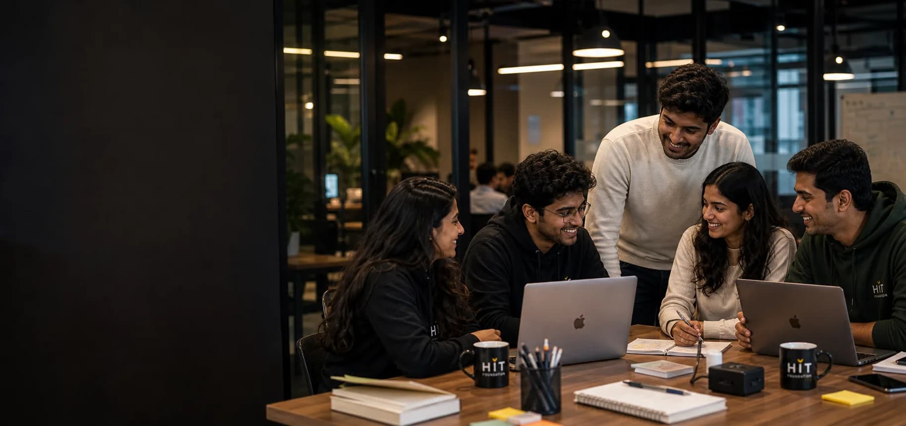 HIT Foundation members in a genuine group discussion in a modern lab